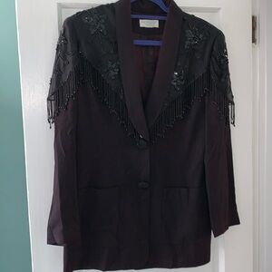 Beautiful black blazer with attached sequin scarf.